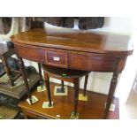 A 19th Century mahogany demi-lune card table with inlaid decoration.