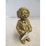 A brass clown money box.