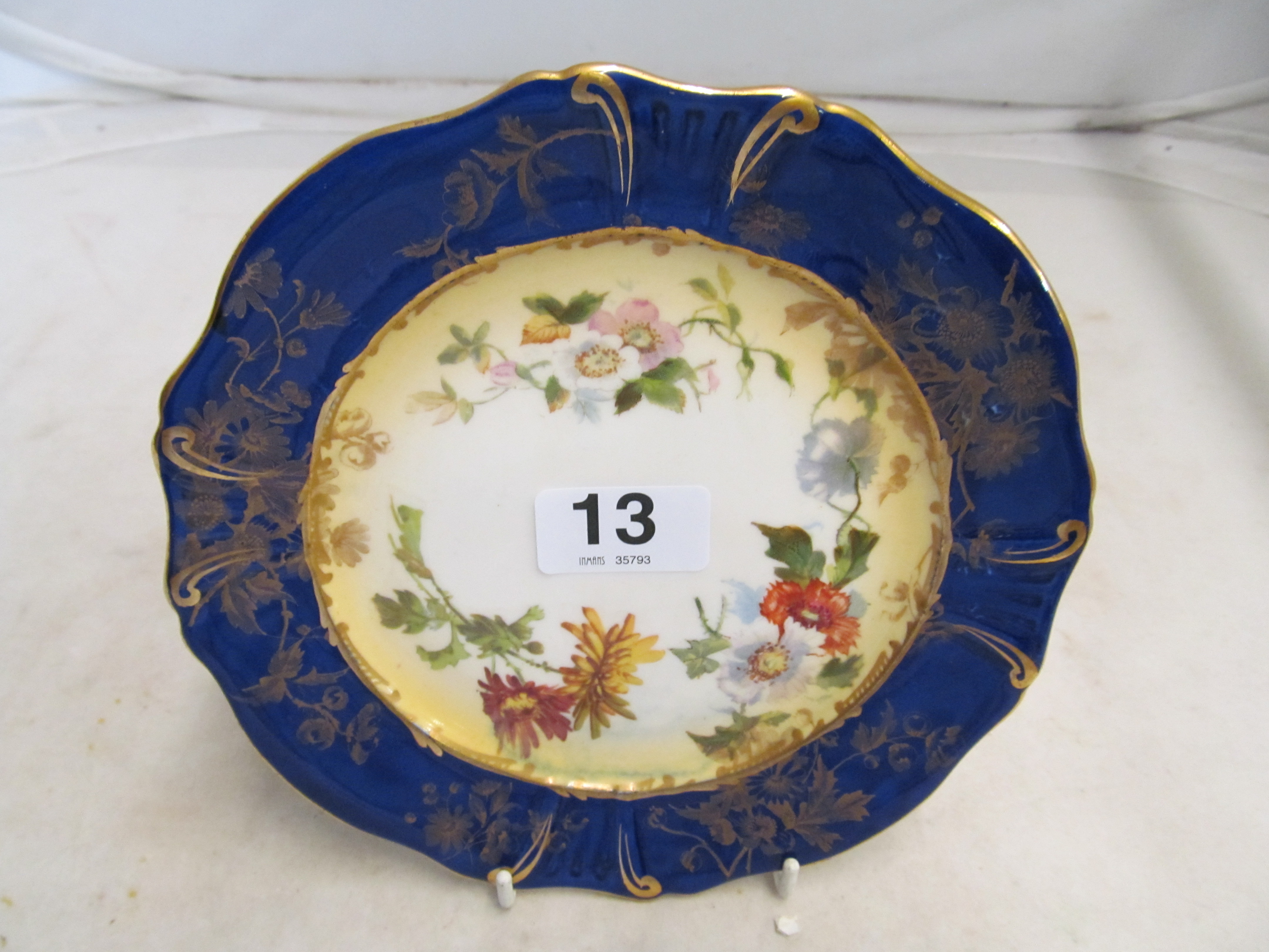 A 19th Century blue and gilt plate, pair Hammersley moustache cups, part teaset and inkstand