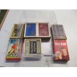 A set of Players cigarette cards, Navy Cut cigarette pack and various playing cards