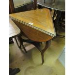 An Edwardian trefoil dropflap table