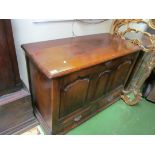 A late 18th Century blanket chest with arched panelled front and two drawers below