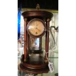 A mahogany temple style clock