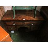 A 19th Century mahogany and ebonized dressing table with four drawers