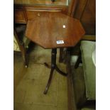 A pair of mahogany tripod tables.