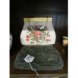 A beaded and embroiderd evening bag flower design, and another beaded evening bag.
