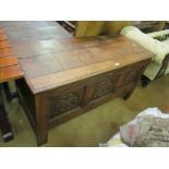 A 18th Century oak coffer with triple panel.