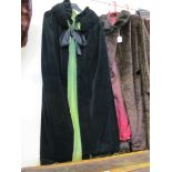 A black velvet full length cape