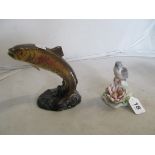 A Beswick style ornament leaping salmon (restored) and a Lladro bird and waterlily (a/f)