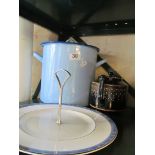 An enamel tin, cakestand and teapot