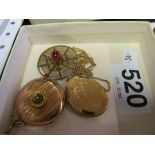 Two 9ct gold back and front lockets and spider pendant.