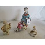 Two Edwardian nodding head figures oriental man and lady (slightly a/f) and a Satsuma style figure