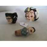 A Royal Doulton Character jug Dick Turpin, another Captain Henry Morgan and a bottle stopper man