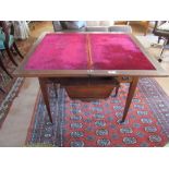 An Edwardian rosewood card/sewing table on square tapered legs