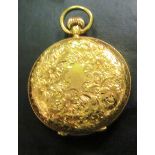 A ladies 18ct gold fob watch with floral engraved case.