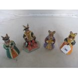 Four Royal Doulton Bunnykins Tudor Collection; Henry VIII, Catherine Parr, Anne Boleyn, and Anne