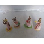 Eight Royal Doulton Bunnykins figures; Golfer, Stopwatch (a/f), Retail Therapy, Sitting on a