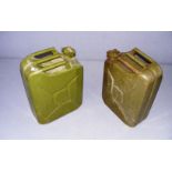 Two military style green painted Jerry cans.