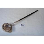 A mid 18th century George II silver punch ladle coin inset to the bowl with a wrythen bone handle,