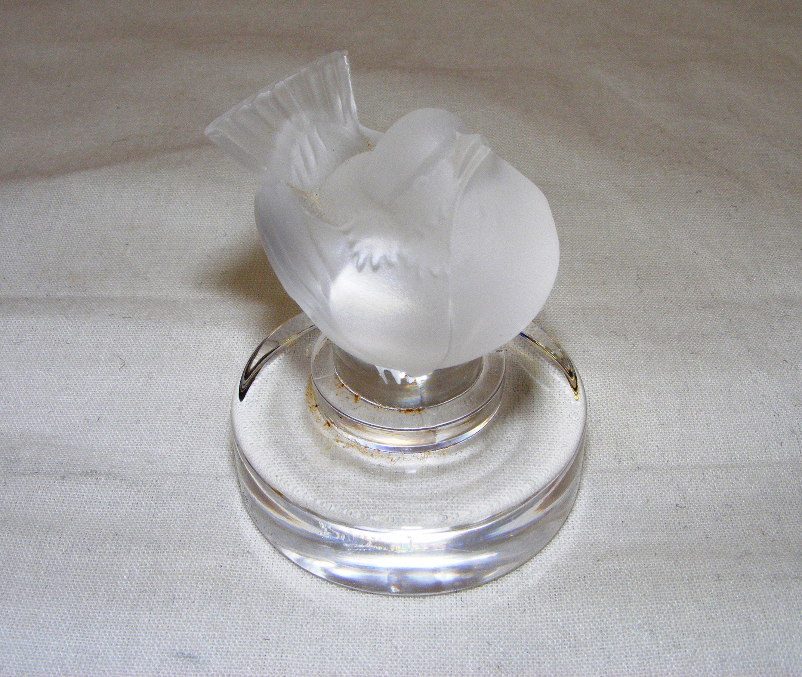 A Lalique frosted glass bird paperweight measuring 6cm tall and signed to the base. - Image 2 of 3