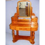 A late Victorian Duchess mahogany dressing table measuring 41" wide.