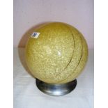 An 1940's French ceiling light, formed as a sphere with a mottled yellow glass and gold lines,