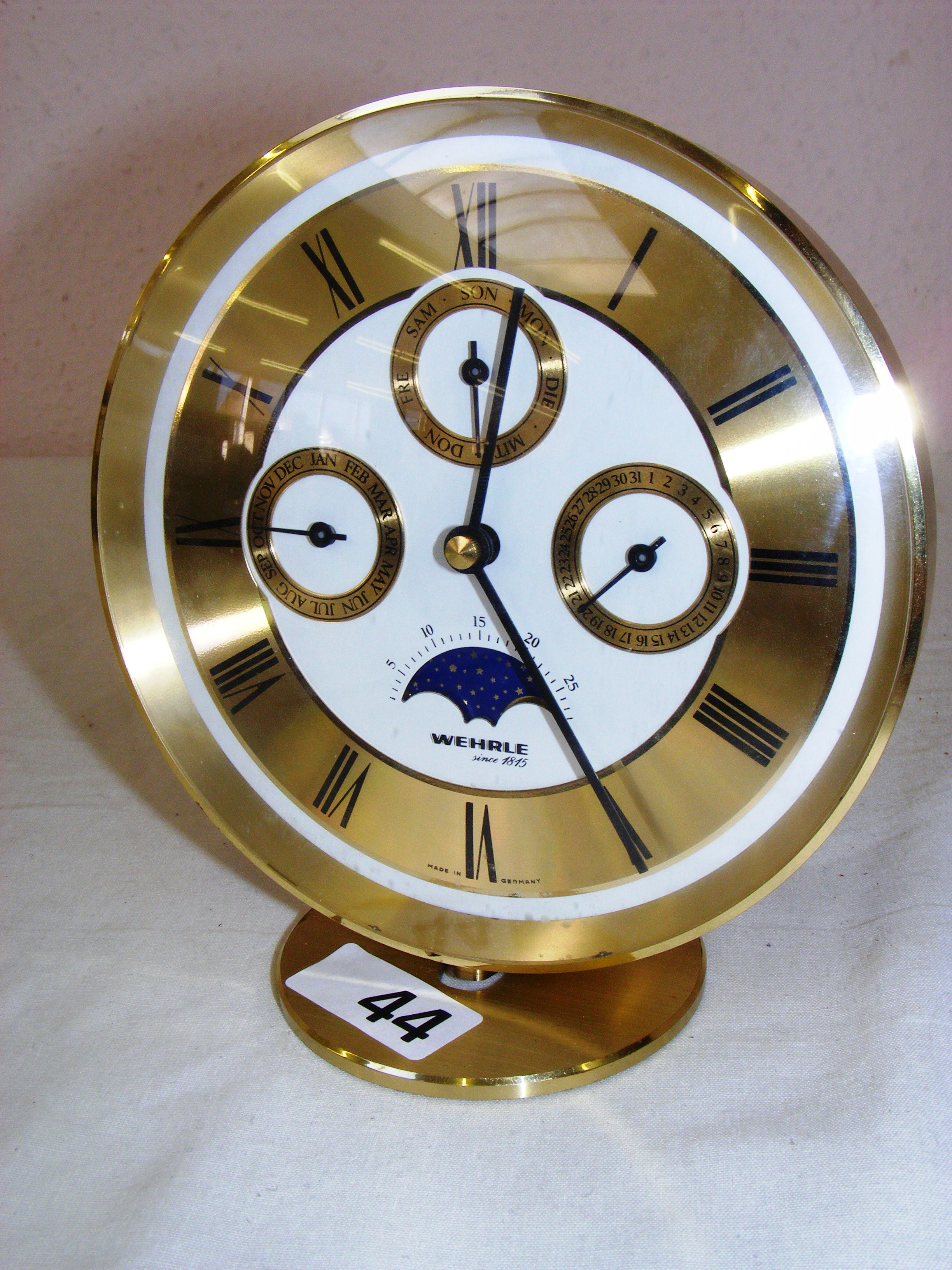 A German Wehrle mantle clock measuring 6.5" tall.