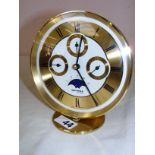 A German Wehrle mantle clock measuring 6.5" tall.