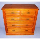 A James Shoolbred and Co. late Victorian / Edwardian chest of drawers measuring 40.5" wide.