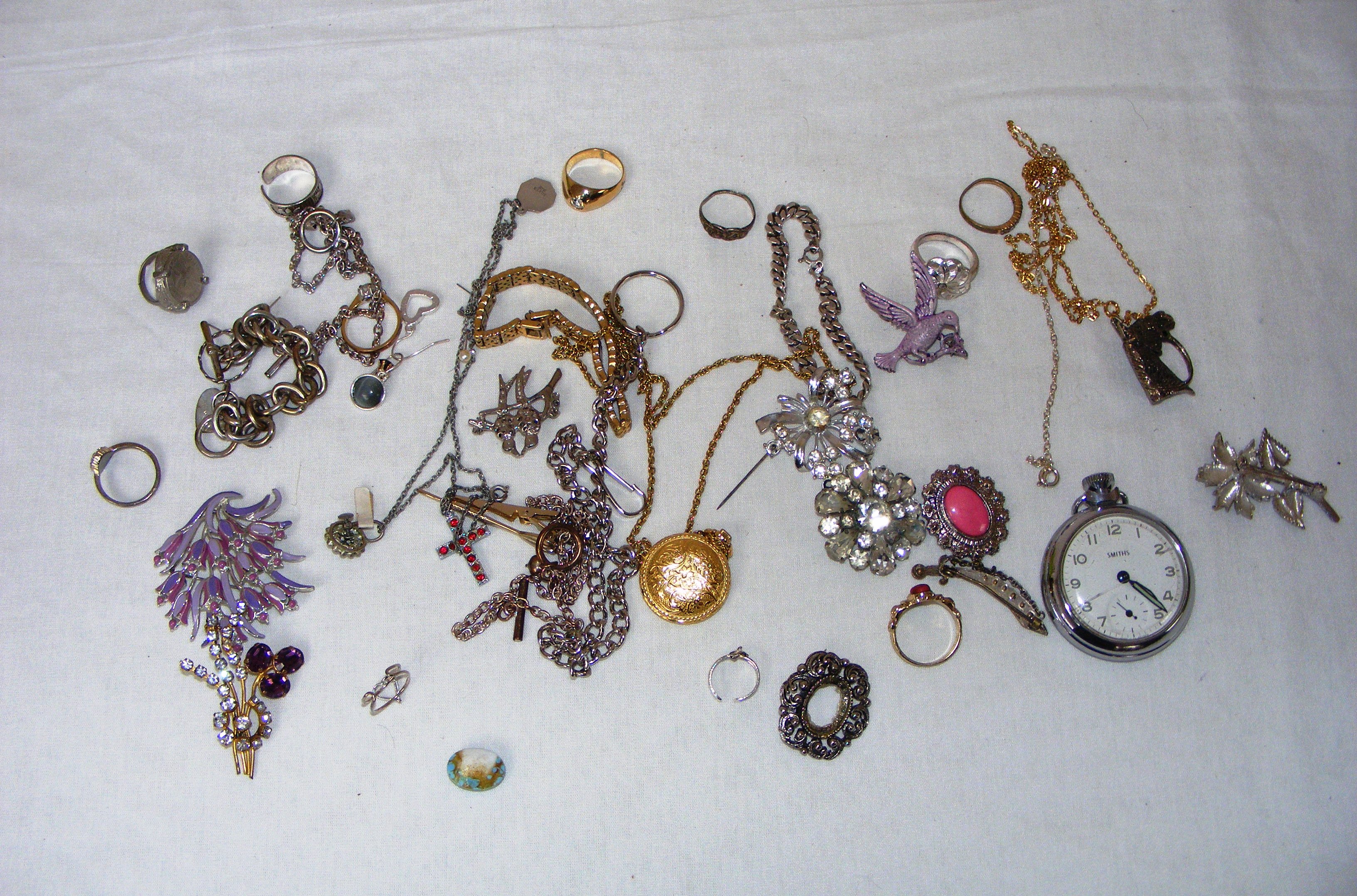 A tray of assorted including a Smiths pocket watch,