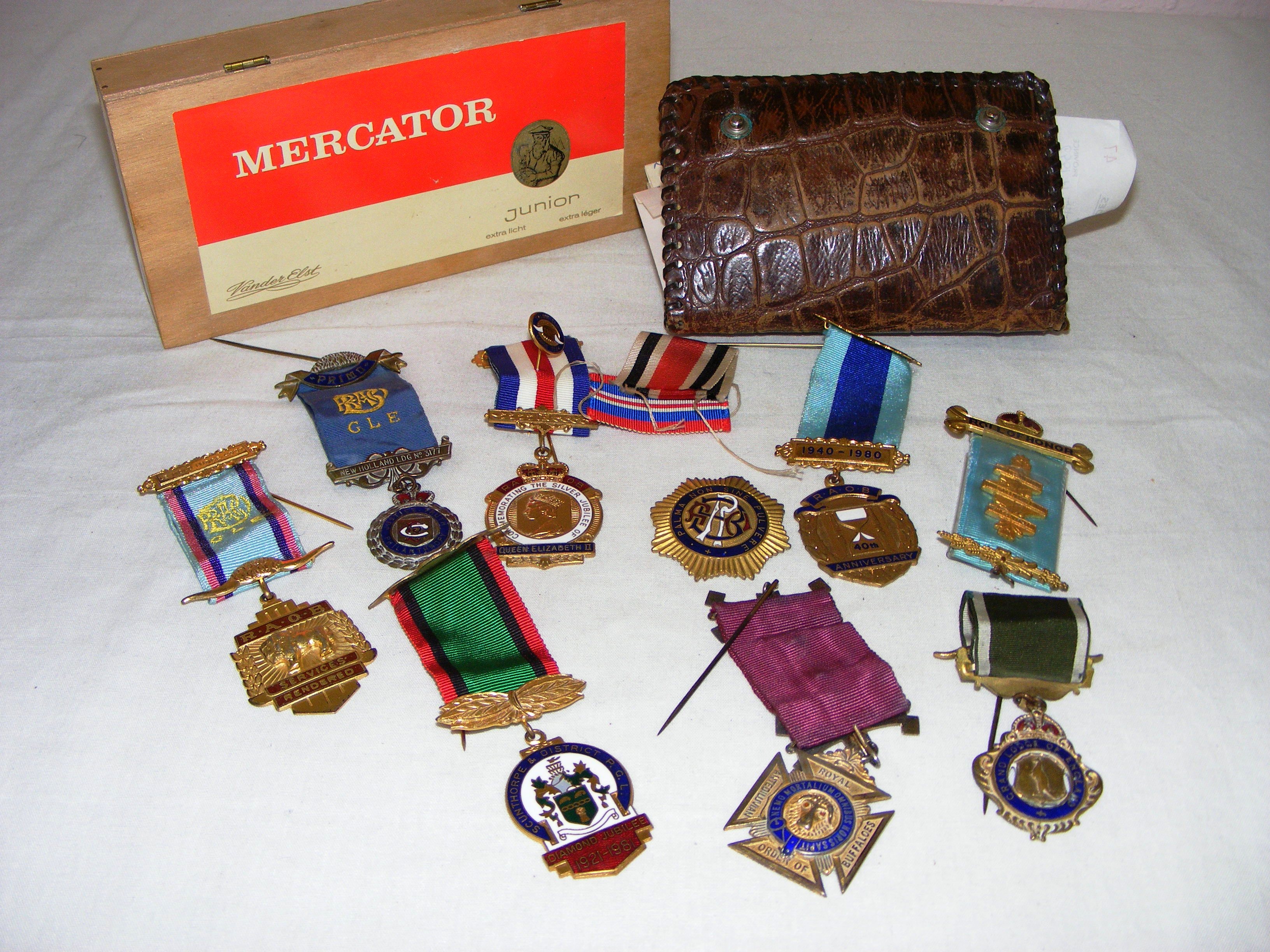 A collection of Masonic & Buffalo medals including associated paperwork, some silver gilt examples,