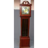 A modern Grandfather clock measuring 76" tall.