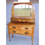 A late Victorian walnut fronted dressing table measuring 42" wide.