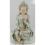 A CHINESE PORCELAIN SEATED BUDDAH