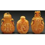 THREE CHINESE CARVED HORNBILL SNUFF BOTTLES