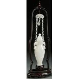 A FINE CHINESE CARVED WHITE JADE HANGING VASE