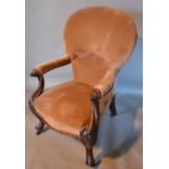 A Victorian Rosewood Drawing Room Armchair with an upholstered back and serpentine seat with carved
