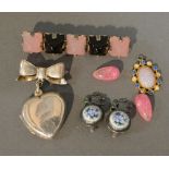 A 925 Silver Locket Brooch in the form of a Heart with a Bow, together with a hardstone set brooch,