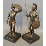 A Pair of Patinated Bronze Figures in the form of Roman Centurions with Shield and Spear,