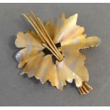An 18ct. Gold Brooch in the form of a Leaf, maker's mark TAD, 18.