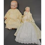 An Armand Marseille Bisque Head Doll with Composition Jointed Body,