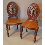 A Pair of Regency Mahogany Hall Chairs,