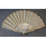 A Brussels Needlepoint Lace Fan with a Foliate Scroll Design and Mother of Pearl Sticks and with