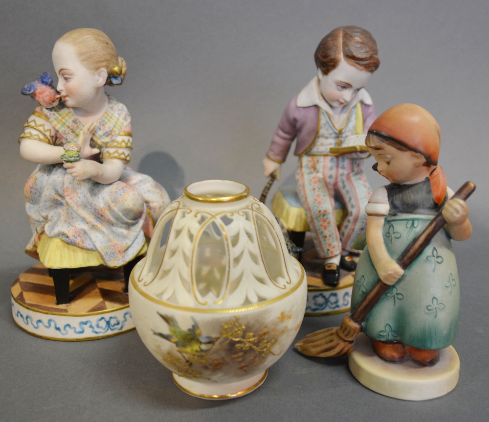 A Pair of Continental Bisque Figures with Polychrome Decoration,