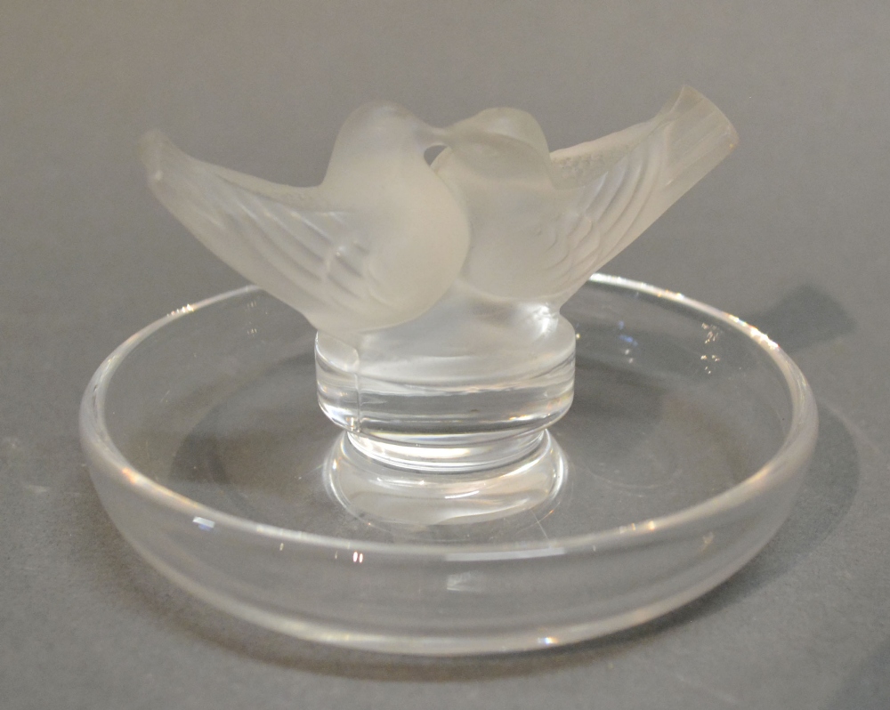 A Lalique Glass Pin Tray mounted with two opaque glass Doves,