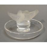 A Lalique Glass Pin Tray mounted with two opaque glass Doves,