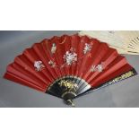 Two Ivory and Silkwork Fans, together with another ebonised fan with gilt decoration and rouge silk,