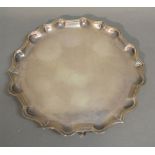 A Victorian Silver Presentation Salver of Shaped Outline, with three hoof supports, London 1900,