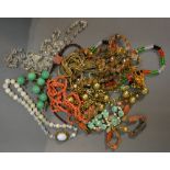 A Coral Bead Necklace together with a collection of other necklaces