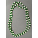 A Cultured Pearl and Green Hard Stone Bead Necklace
